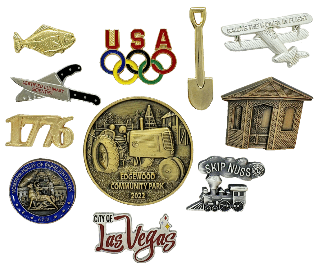 How Custom Pins and Challenge Coins Are Made: Behind the Scenes at The Pin Center 4 Assorted 3D and die‑cast custom pins with unique shapes, showcasing sculpted metal details, raised textures, and premium craftsmanship.
