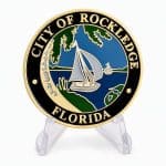 Hard enamel coin of a Sailboat off the coast of Florida, made for the City of Rockledge