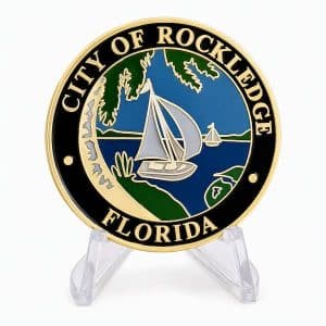 Hard enamel coin of a Sailboat off the coast of Florida, made for the City of Rockledge