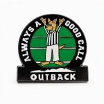 Outback‑themed ‘Always a Good Call’ pin showing a kangaroo referee on a football field in a bold, playful sports design.