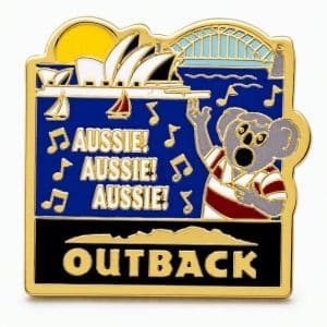 Cartoon koala in a rugby shirt shouting ‘Aussie Aussie Aussie’ with the Sydney Opera House and harbor in the background.