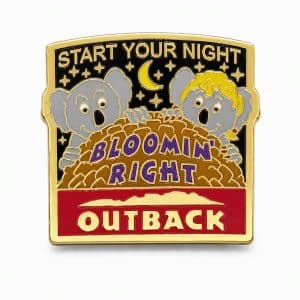 Outback‑themed ‘Start Your Night Bloomin’ Right’ pin showing two koalas looking over a delicious Bloomin’ Onion, styled in a fun, food‑focused design.