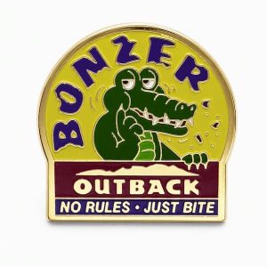 Cartoon crocodile in the ‘Bonzer — No Rules Just Bite’ design, shown with a wide grin and crumbs or bite marks suggesting he just chomped into something.