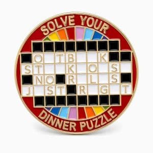 Outback dinner puzzle pin that removes all the vowels but still reads ‘Outback Steakhouse No Rules Just Right.’