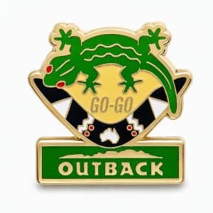 Outback‑themed ‘Go‑Go Gecko’ pin showing a red‑eyed gecko positioned over a boomerang with the Outback logo underneath for bold Aussie styling.