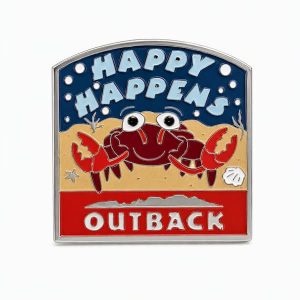 A smiling crab walking on the ocean floor with the phrase 'happy happens' and the Outback logo beneath