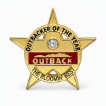 Star shaped lapel pin honoring the Employee of the Year with a rhinestone and Outback logo, with the phrase "The Bloomin' Best" - created by The Pin Center