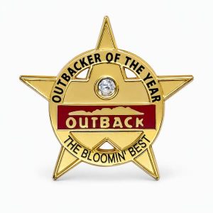 Star shaped lapel pin honoring the Employee of the Year with a rhinestone and Outback logo, with the phrase "The Bloomin' Best" - created by The Pin Center