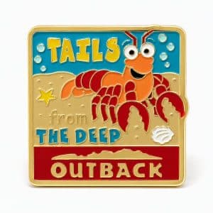 Outback‑inspired ‘Tails from the Deep’ pin featuring a cheerful lobster character in a bold, cartoon style.