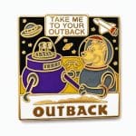 Space-themed Outback lapel pin, featuring an astronaut kangaroo with a space robot saying "take me to your Outback"