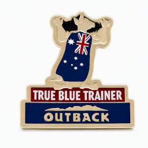 Lapel pin of a Kangaroo showing off his Australian flag cape with the phrase "True Blue Trainer" and the Outback logo, created by The Pin Center