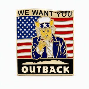Kangaroo dressed up as Uncle Sam pointing at the viewer, saying 'We want you' with a USA flag in the backdrop. A lapel pin with the Outback logo, created by The Pin Center