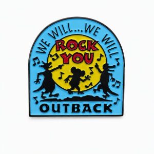 Lapel pin for Outback featuring the silhouettes of a dancing kangaroo, koala, and croc with the phrase "we will we will rock you"